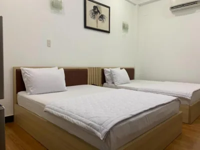Vierpersoonskamer — Minh Hà Hotel Hồ Chí Minh